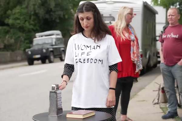 Iranian-Danish Artist Shreds Quran Outside Iran’s Embassy