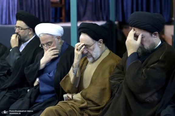 Former presidents Hassan Rouhani (2nd left) and Mohammad Khatami (3rd left) during a religious ceremony