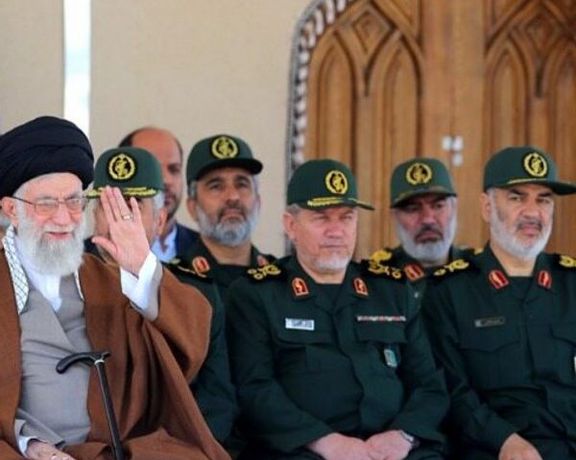 Supreme Leader Ali Khamenei (left) and a number of senior members of the Revolutionary Guard