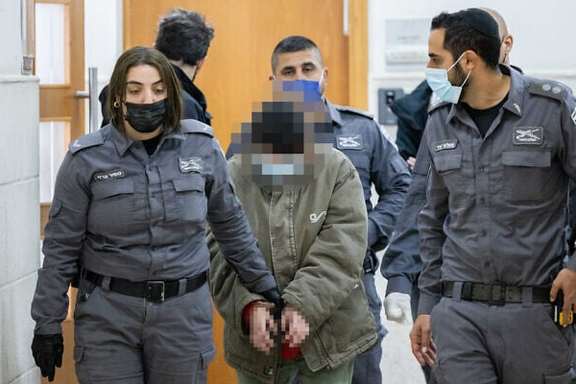 A woman accused of contacting a foreign agent from Iran, arrives for a court hearing in the Jerusalem District Court, January 20, 2022
