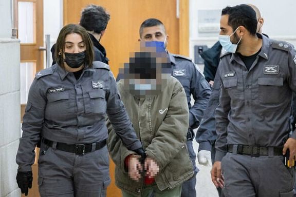 A woman accused of contacting a foreign agent from Iran, arrives for a court hearing in the Jerusalem District Court, January 20, 2022