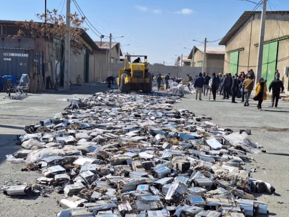 Authorities destroying illegal cryptocurrency mining equipment in Alborz province (file photo)