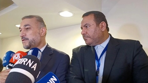 Iran’s Foreign Minister Hossein Amir-Abdollahian (left) on the sidelines of an emergency meeting of the Organization of Islamic Cooperation’s (OIC) executive committee in Saudi Arabia’s Jeddah on October 18, 2023