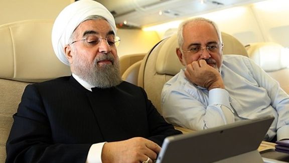 Former president Hassan Rouhani (left) and former foreign minister Javad Zarif