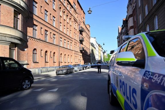 Police posted on Storgatan Street where gunfire was heard during the night to Friday in Stockholm Sweden, May 17, 2024.