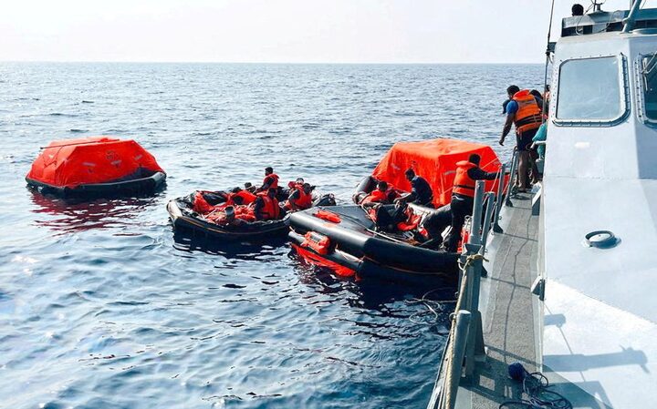 Sri Lanka Navy personnel assist Iranian sailors during a rescue operation after responding to a distress call from their vessel, the Iranian military ship, IRIS Dena, while at sea within Sri Lanka’s maritime search and rescue region, in Indian Ocean, Sri Lanka, March 4, 2026. 