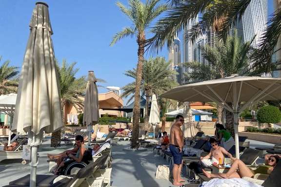 Tourists rest at the Habtoor Grand Resort, in Dubai, February 1, 2022.