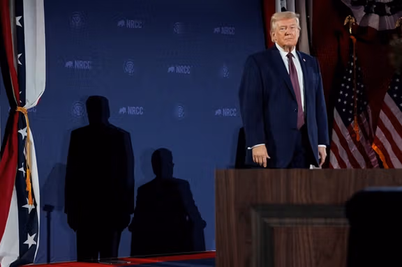 U.S. President Donald Trump looks on during the National Republican Congressional Committee (NRCC) annual fundraising dinner in Washington, D.C., U.S., March 25, 2026.