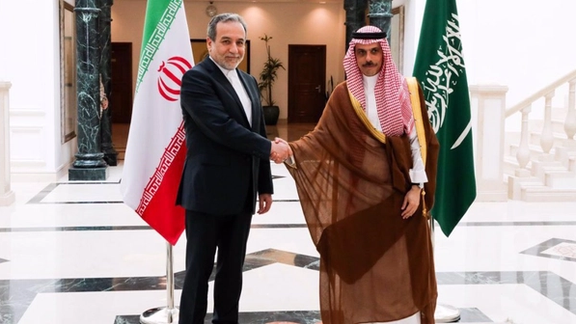 Iranian Foreign Minister Abbas Araghchi (left) shakes hands with his Saudi counterpart Prince Faisal bin Farhan in Jeddah on May 10, 2025.