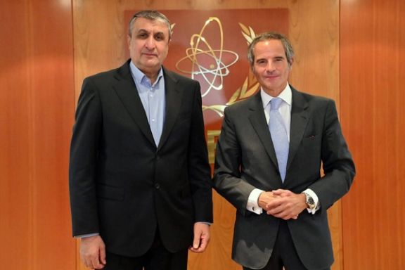 Director General Rafael Grossi of the International Atomic Energy Organization, IAEA, left, and head of Iran's atomic energy department Mohammad Eslami