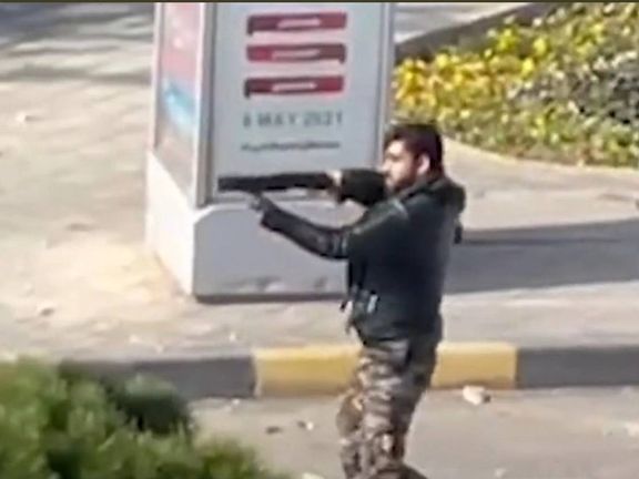 An anti-riot special soldier firing at protesters in Esfahan. November 26, 2021
