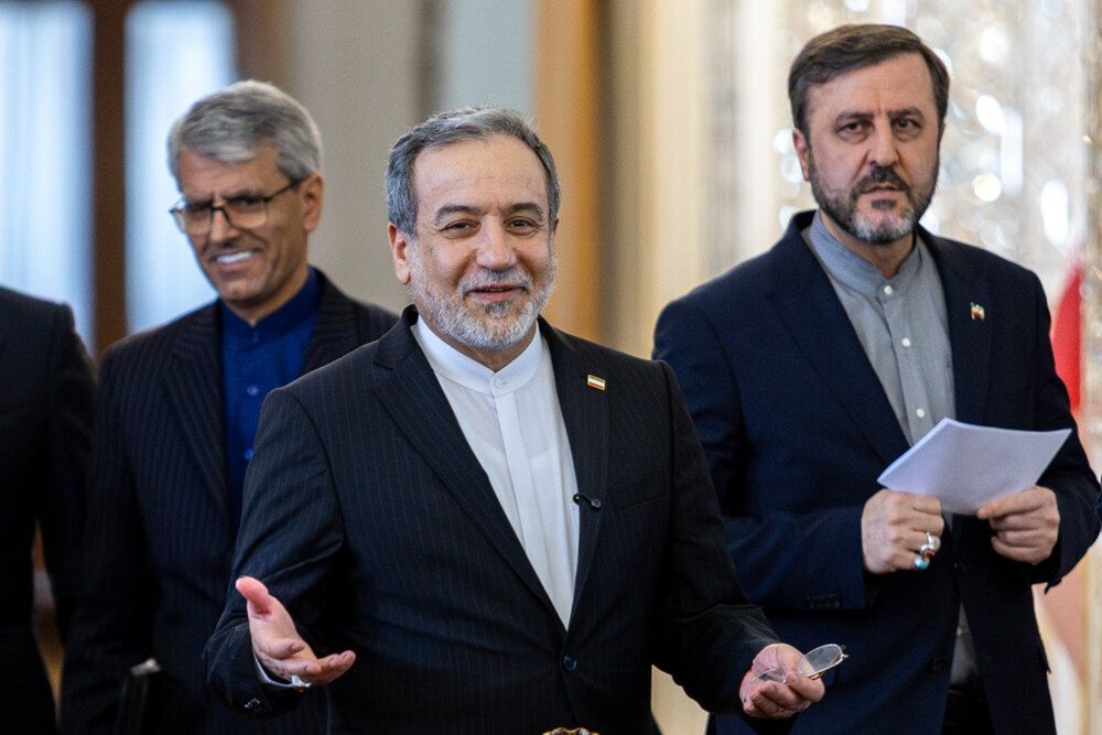 Iranian Foreign Minister Abbas Araghchi, center, with Foreign Ministry spokesman Esmaeil Baghaei, left, and Deputy Foreign Minister Kazem Gharibabadi in Tehran, Iran, June 16, 2026.