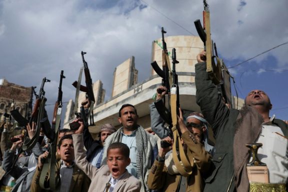 Houthi supporters hold up their weapons during a protest against Israel in Sanaa, Yemen March 11, 2025.