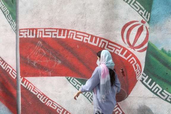 An Iranian woman walks in a street in Tehran, Iran, April 9, 2023.