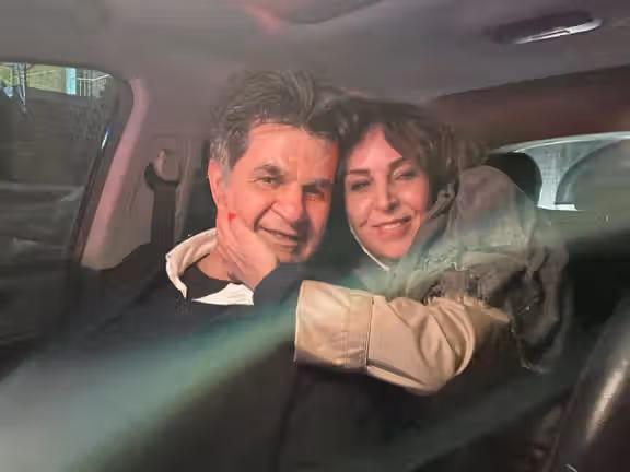 Film director Jafar Panahi, who was released from jail on February 3, and his wife, pose in Tehran, Iran in this undated picture obtained from social media on February 3, 2023.