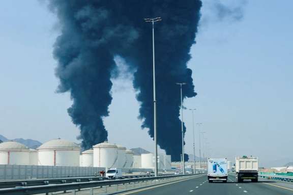 Smoke rises in the Fujairah oil industry zone, caused by debris after interception of a drone by air defenses in Fujairah, United Arab Emirates, on March 14, 2026. (File photo)