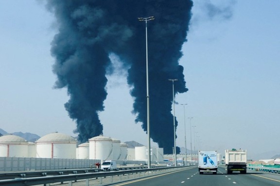 Smoke rises in the Fujairah oil industry zone, caused by debris after interception of a drone by air defenses in Fujairah, United Arab Emirates, on March 14, 2026. (File photo)