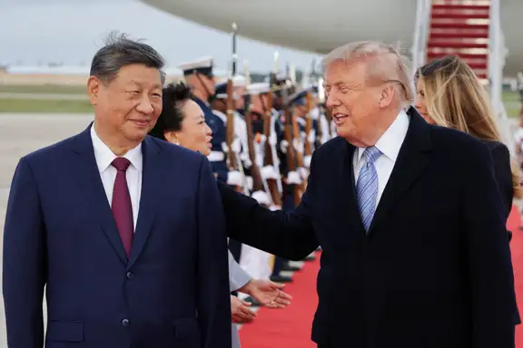 US President Donald Trump and Chinese President Xi Jinping react as Xi arrives ahead of a state visit at Joint Base Andrews, Maryland, US, September 23, 2026.