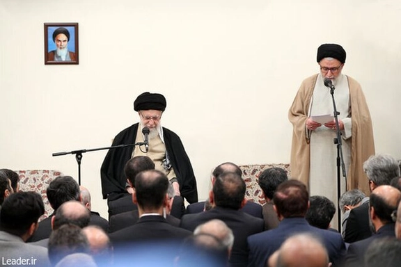 Ali Khamenei (left) meets with intelligence ministry staff on February 19, 2025, as Minister Esmail Khatib (right) delivers a report.