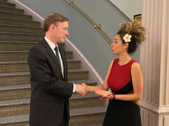 US National Security Advisor Jake Sullivan (left) and Iranian women’s rights activist Masih Alinejad