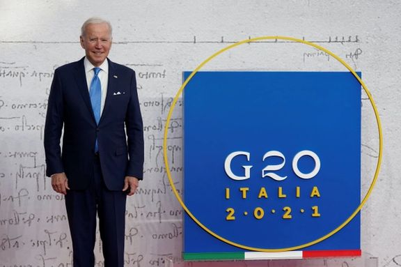 US President Joe Biden poses for a picture as he arrives for the G20 leaders' summit in Rome, Italy October 30, 2021.