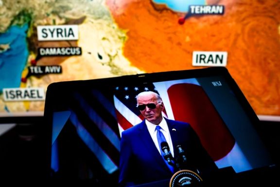 President Joe Biden, appears talking about the war between Iran and Israel, in a video on a smartphone screen.