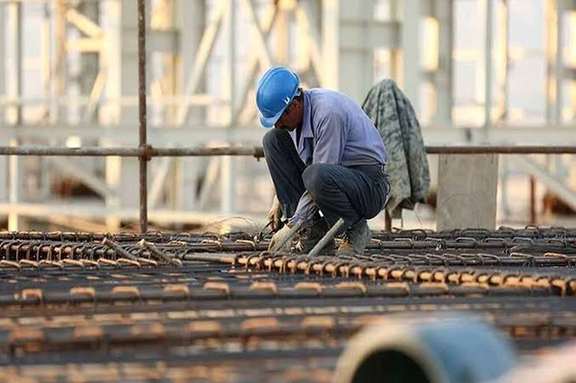 An Iranian construction worker