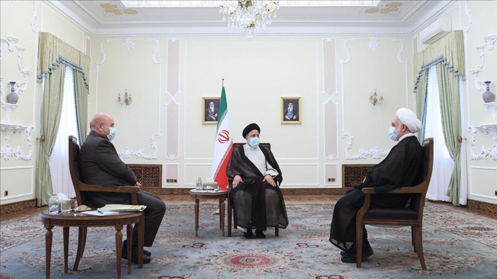 Iran’s President Ebrahim Raisi (center), Parliament Speaker Mohammad-Bagher Ghalibaf (left), and Chief Justice Gholam-Hossein Mohseni-Ejei during a meeting 