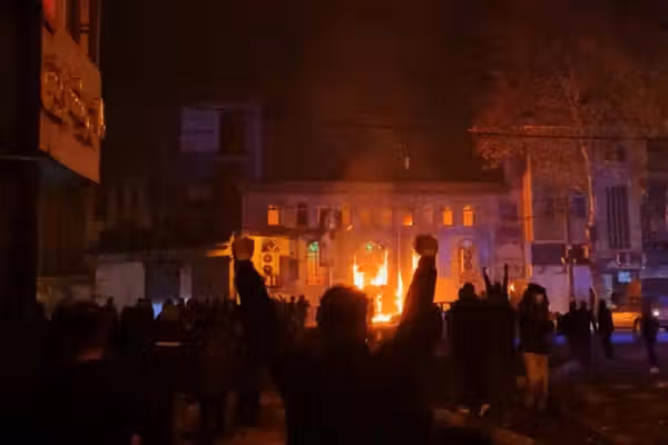 Witnesses describe gunfire, blocked exits and deadly market fire in Rasht