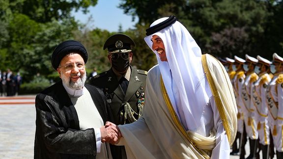 Qatar's Emir with Iran's president in Tehran on May 12, 2022