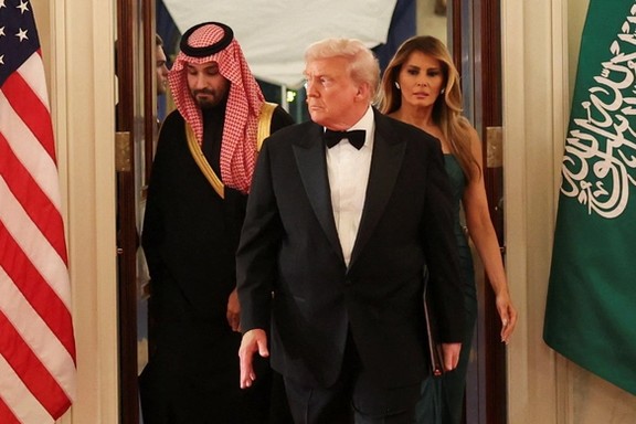 US President Donald Trump, first lady Melania Trump and Saudi Crown Prince and Prime Minister Mohammed bin Salman arrive for a dinner, in Washington, DC, November 18, 2025.