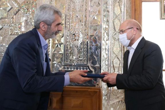 Pejman Pashmchizadeh (left) and Parliament Speaker Mohammad Bagher Ghalibaf