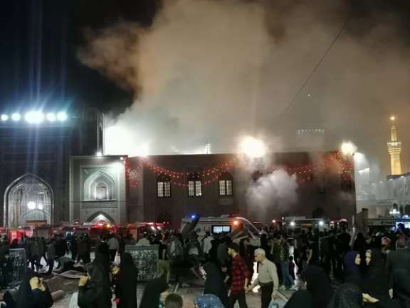 Smoke billows in the courtyard of the Iman Reza shrine in the city of Mashhad in Khorasan-Razavi Province on April 29, 2022.