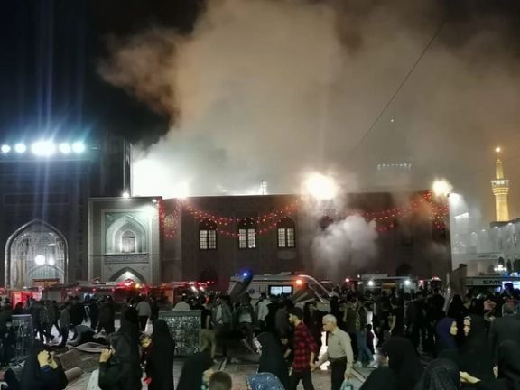 Smoke billows in the courtyard of the Iman Reza shrine in the city of Mashhad in Khorasan-Razavi Province on April 29, 2022.