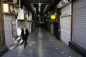 From Tehran’s Bazaar to the middle class, anger outpaces government
