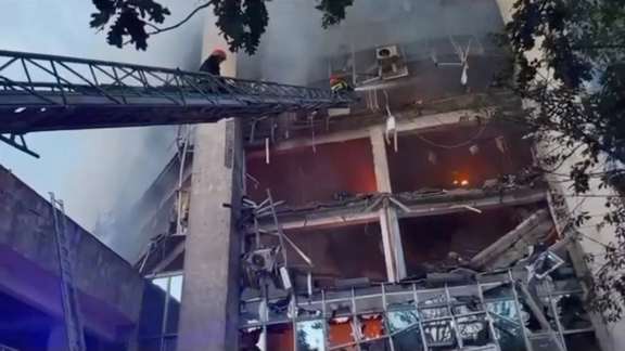 Firefighters work at a damaged property following a Russian drone attack at Izmail, Odesa region, Ukraine, August 2, 2023.
