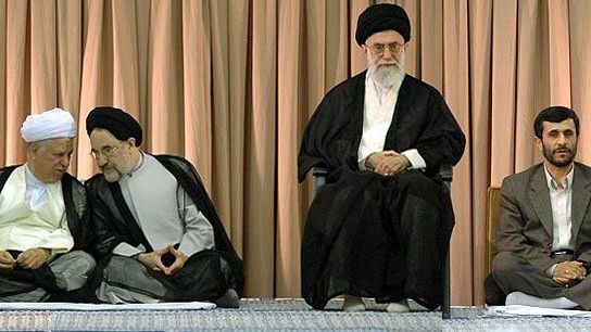 Two former presidents on the left and Ahmadinjad to Khamenei's right during his presidency