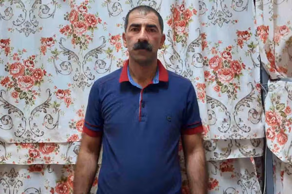 Iran political prisoner sews lips shut to protest detention - rights group