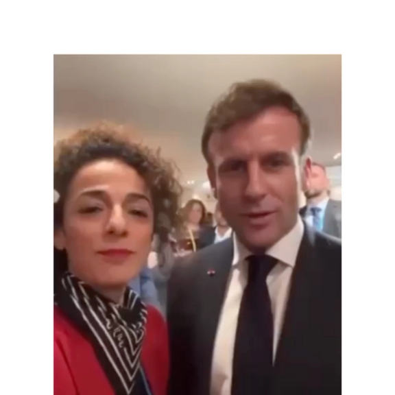 Masih Alinejad speaking with French President Emmanuel Macron in Munich on February 17, 2023