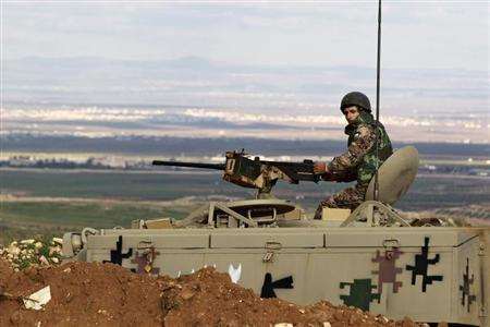 A Jordanian soldier guarding the border with Syria