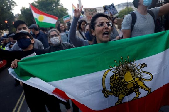 Protestors stand in solidarity with Iranian women after the death of Mahsa Amini, in London, Britain September 24, 2022.