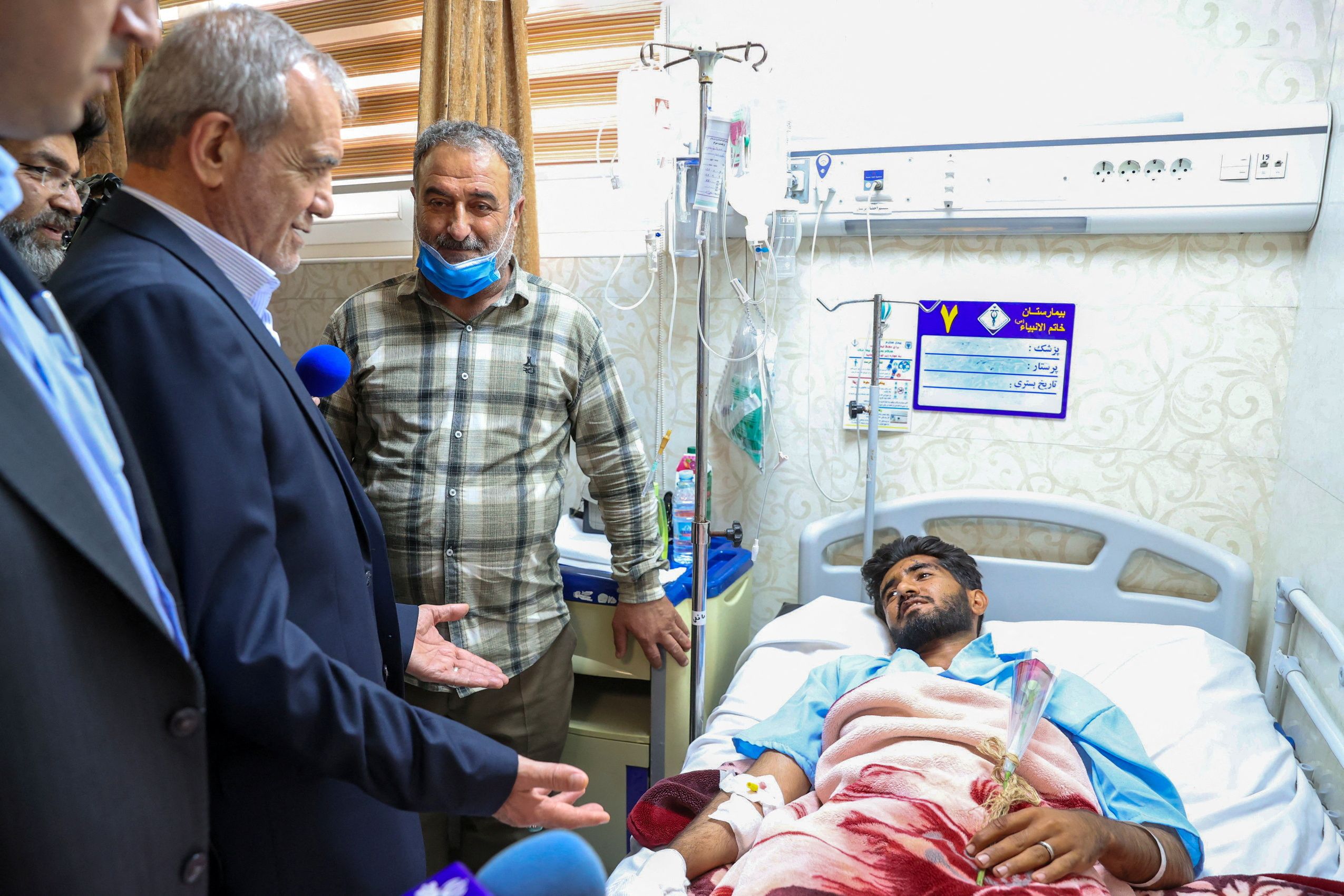 Iranian President Masoud Pezeshkian visits injured people following an explosion at the Shahid Rajaee port in Bandar Abbas, Iran, April 27, 2025.
