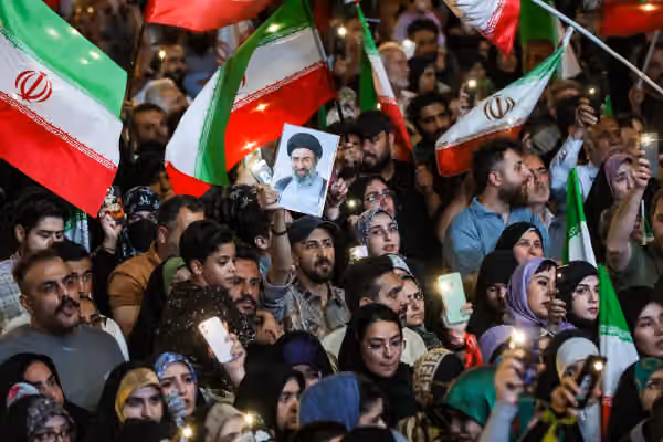 Iran’s nightly pro-state rallies become factional battleground