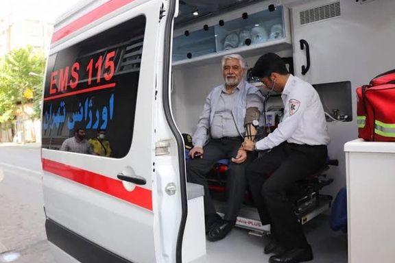 An Iranian man receiving medical care in an ambulance