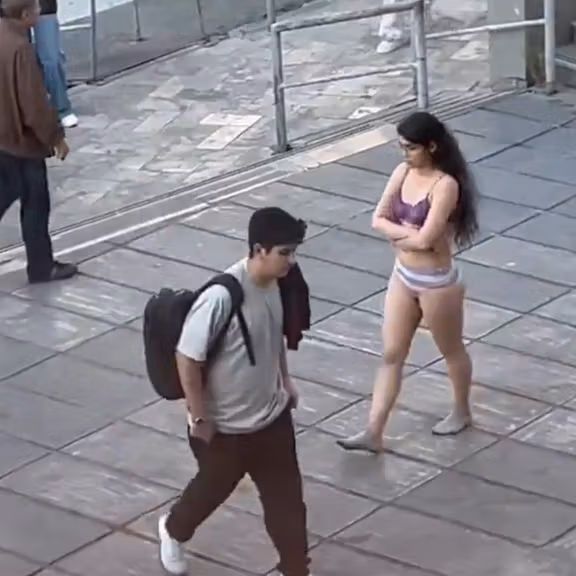 UN warns all eyes on Iran after woman stripped in hijab protest