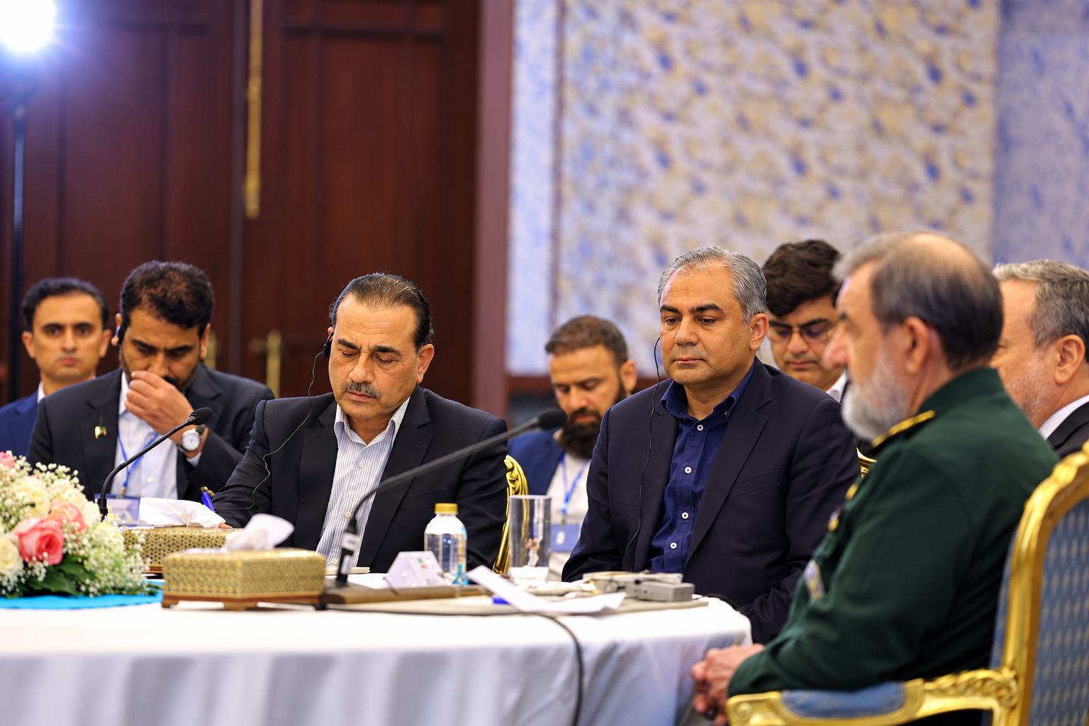 Officials attend a four-way meeting between Iran, Pakistan, Turkey and Saudi Arabia in Tehran on October 26, 2026, to discuss developments in the Middle East.