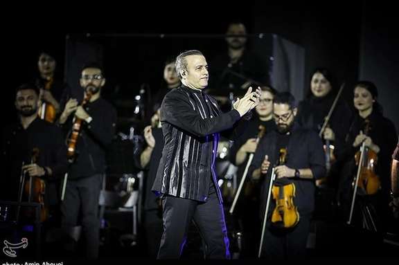 File photo of Iranian singer Alireza Ghorbani during a concert