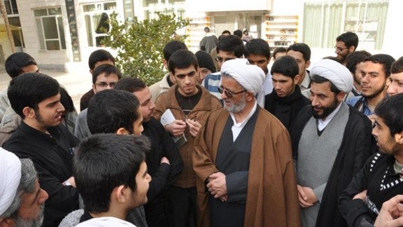 Seminary students mingle with their teachers.
