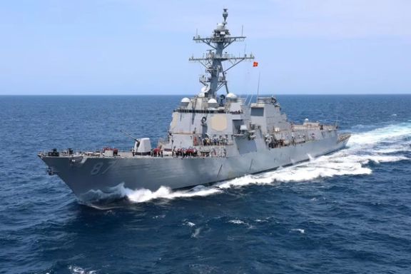 The US Navy guided-missile destroyer USS Mason pulls alongside a fleet replenishment oiler in the Atlantic Ocean, July 17, 2021.