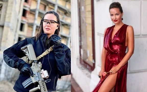 مدل اوکراینی برای دفاع از کشورش اسلحه برداشت